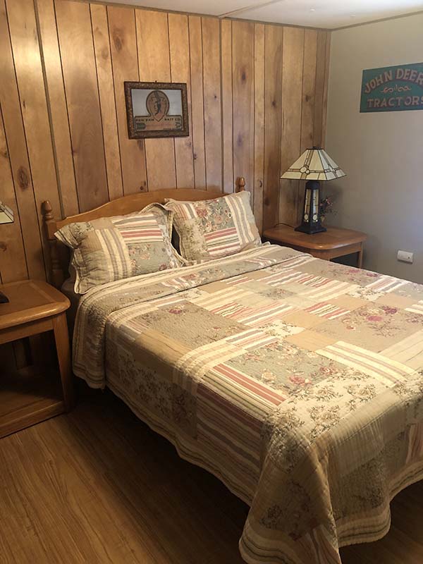 Cabin rentals by J&S Creekside Cabins in DeBruce — guests relaxing on a creekside porch