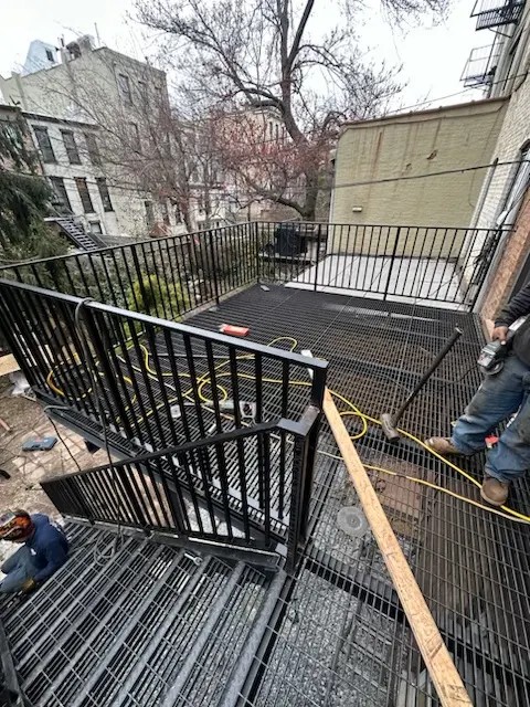 Custom steel staircase with modern design fabricated for Williamsburg Brooklyn commercial loft conversion